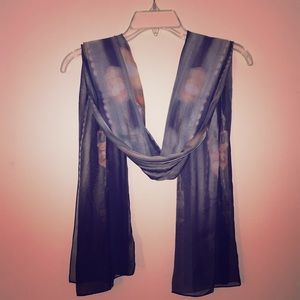 Printed scarf in blue, teal and peach colors